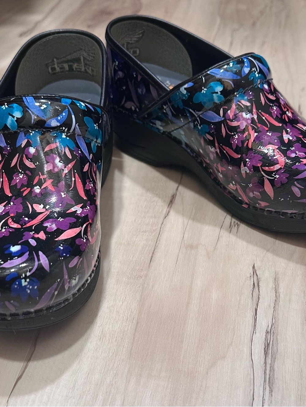 Dansko Black Floral Clogs with Blue & Pink Accents